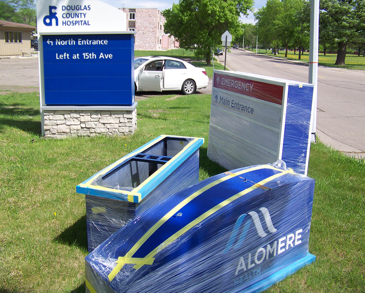 Alomere main campus entrance directionals Changing signage from Douglas County