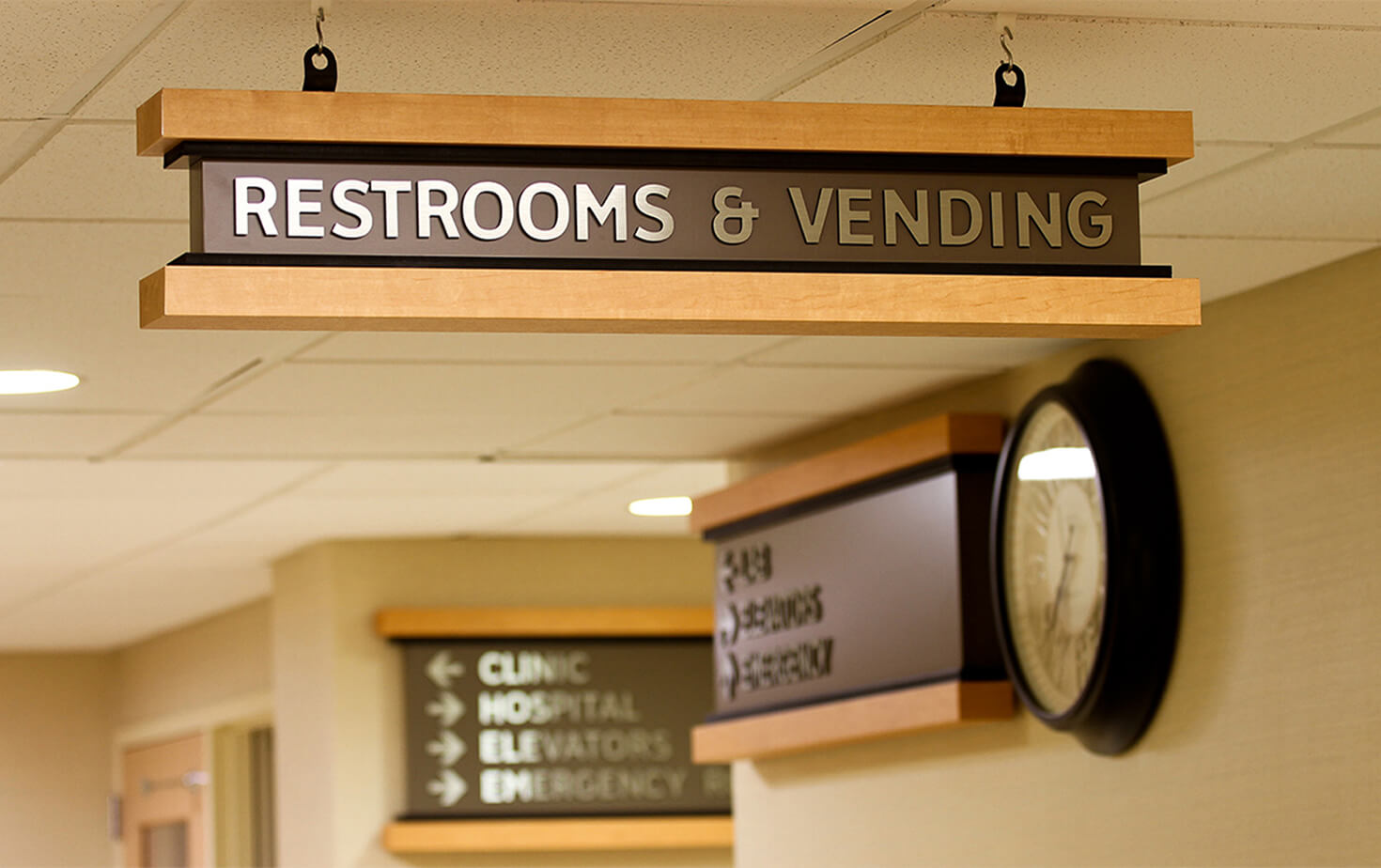 Essentia Health Interior Wayfinding Wall Sign with Wooden accents