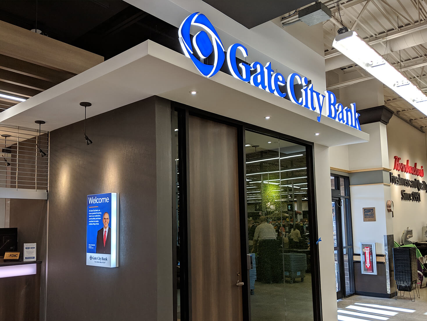 Gate City Bank Moorhead MN Hornbacher's Interior Edge lit letters on rail and edge lit wall cabinets