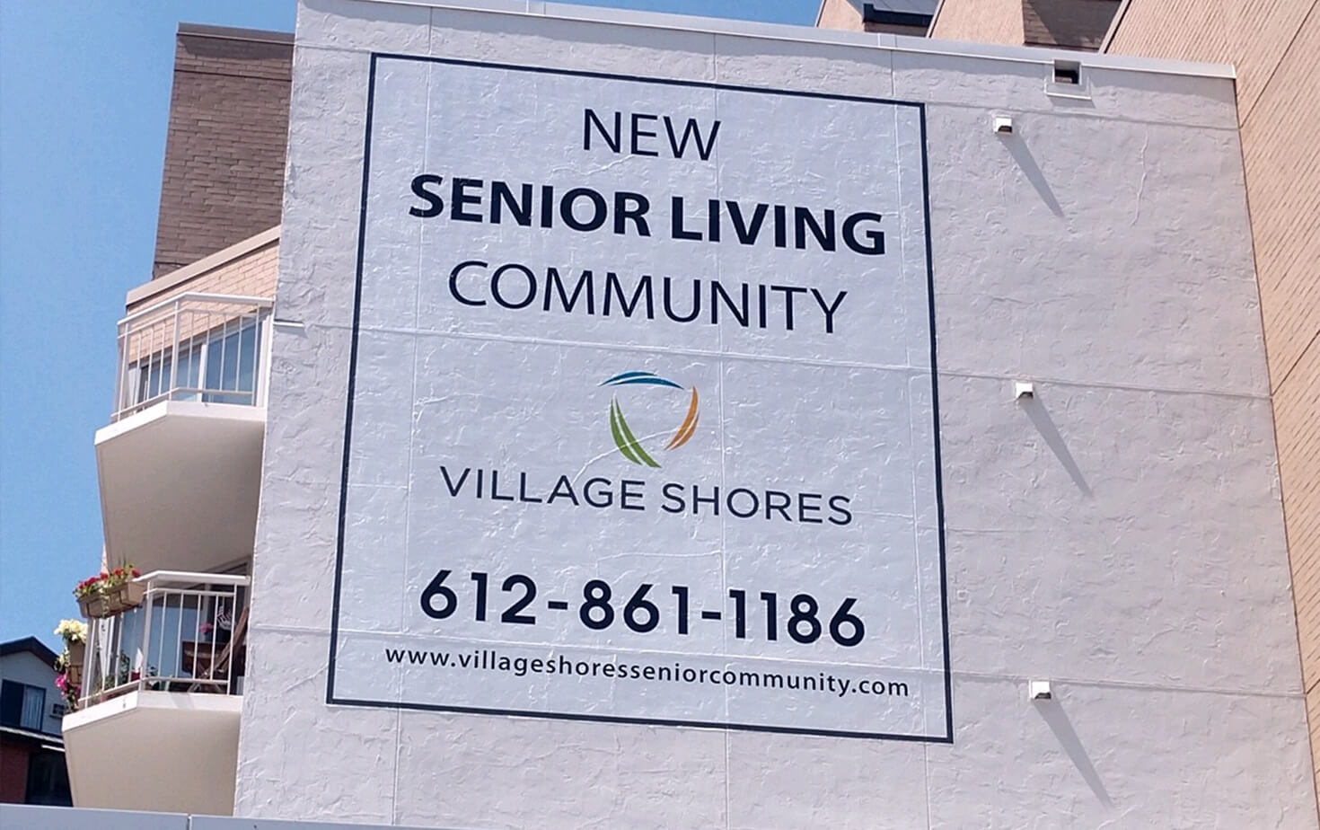 Village Shores Exterior Wall Mural on Side of Building