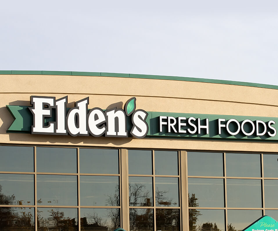 Eldens Fresh Foods Channel Letters on custom shaped raceway on building front Grand Forks ND