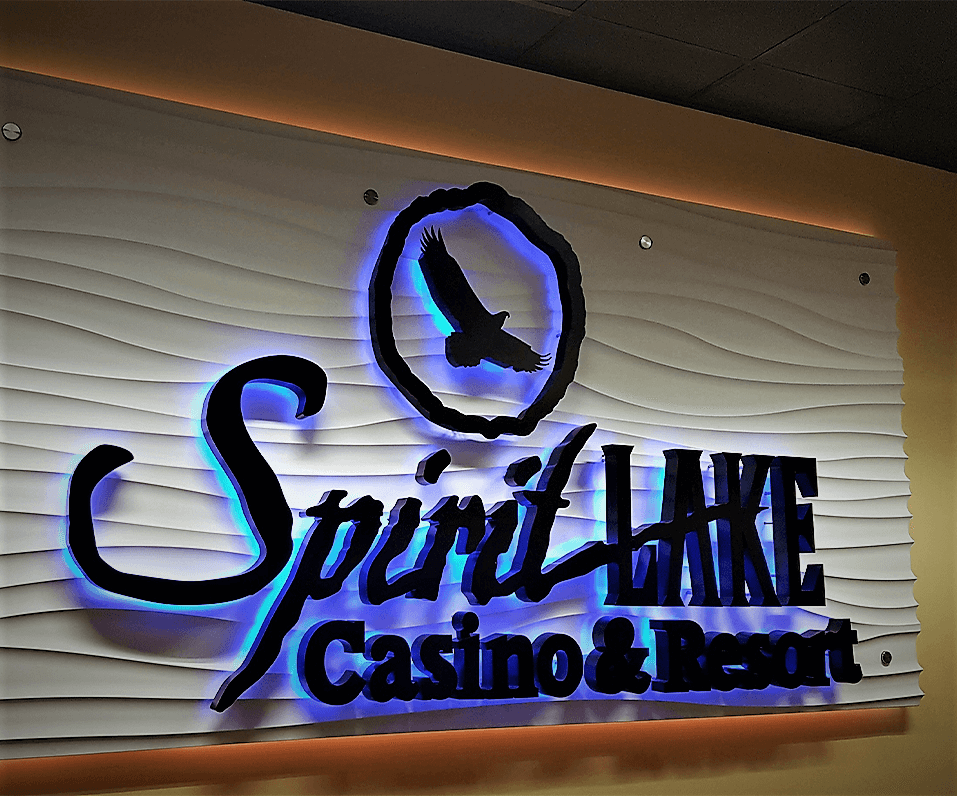 Interior Logo Spirit Lake Casino and Resort backlit on texture backer panel