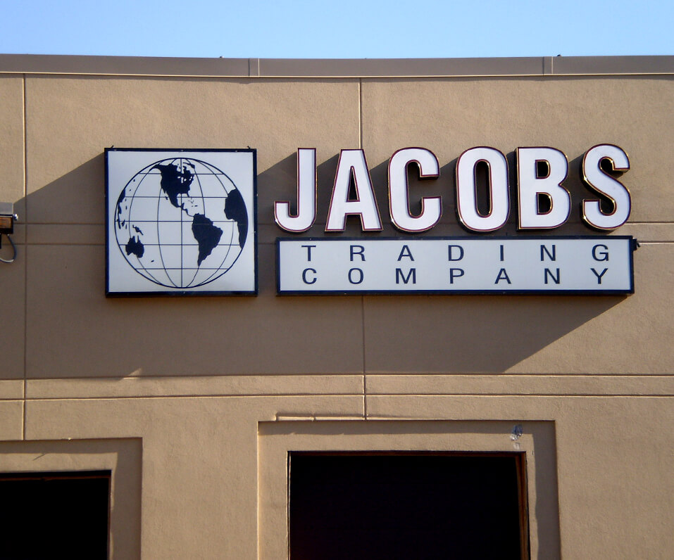 Jacobs Trading Company Channel Letters and logo cabinets on building front