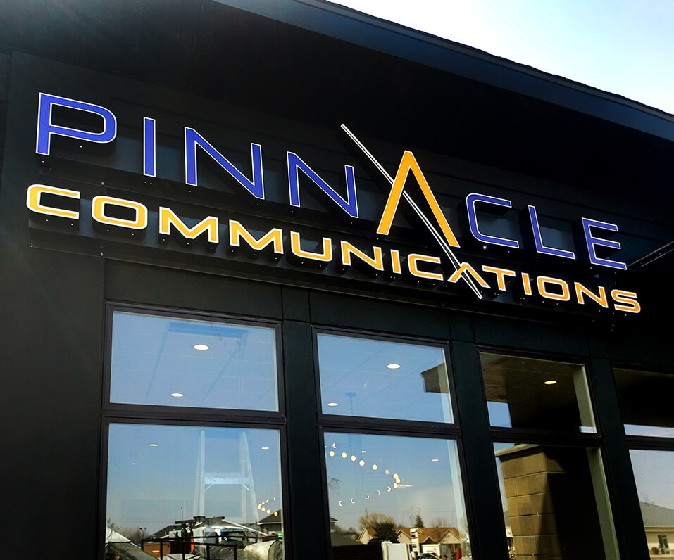 Pinnacle Communications Channel Letters on a raceway over storefront Fargo ND